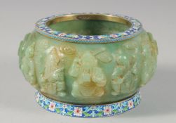 A CHINESE CARVED JADE BOWL with Russian silver and champleve enamel rim and foot rim. 6ins