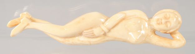 A CHINESE CARVED BONE DOCTOR'S FIGURE. 13cm long.