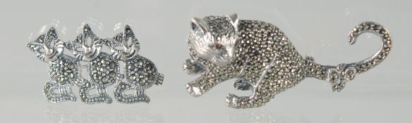 TWO SILVER AND MARCASITE CAT BROOCHES.