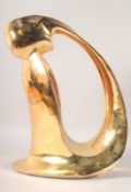 A GILDED METAL ABSTRACT FIGURE. 19ins high.