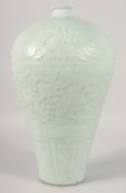 A LARGE CHINESE CELADON GLAZE MEIPING VASE, with body with carved dragon and ruyi, 42cm high.
