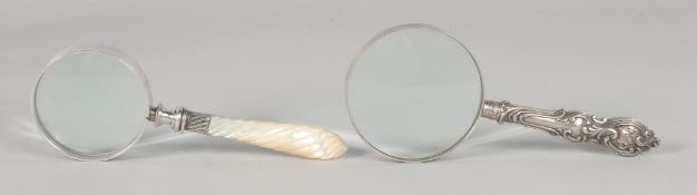TWO MAGNIFYING GLASSES.