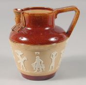 A DOULTON LAMBETH STONEWARE EGYPTIAN REVIVAL JUG. 5.5ins high.