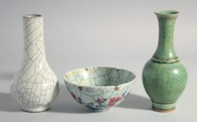 TWO CHINESE CRACKLE GLAZE VASES, 7.5ins & 7ins high, and a circular bowl 5ins high. (3).