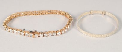 A BABY'S SILVER BRACELET AND A LINE BRACELET (2).