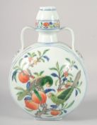 A CHINESE WUCAI PORCELAIN TWIN HANDLE MOON FLASK, painted to each side with parrots and peach