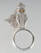 A SILVER OWL SPYGLASS NECKLACE.