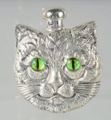 A CAT'S FACE SCENT BOTTLE, with glass eyes. 5.5cm