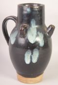 AN UNUSUAL CHINESE POTTERY EWER OR JUG.