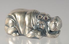 A RUSSIAN CAST SILVER MODEL OF A RECUMBENT HIPPO, Faberge mark.