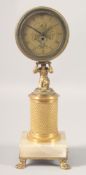 A GILT BRONZE CIRCULAR DESK CLOCK with kneeling figural support on a column, the marble base with
