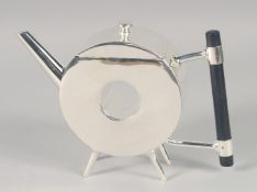 A CHRISTOPHER DRESSER STYLE DOUGHNUT SHAPE TEAPOT.