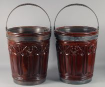 A GOOD PAIR OF GEORGIAN STYLE MAHOGANY AND BRASS PEA BUCKETS with swing handles. 18ins high