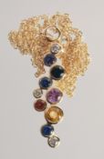 A MULTI - COLOURED NATURAL SAPPHIRE AND DIAMOND PENDANT on chain.