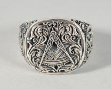 A SILVER MASONIC RING.