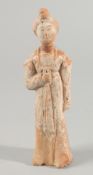 A CHINESE TERRACOTTA FIGURE, 20.5cm high.