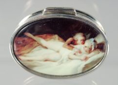 A SILVER AND ENAMEL NUDE PILL BOX. 3.5cm