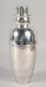 A SILVER-PLATED SNOWMAN COCKTAIL SHAKER. 10.25