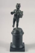 A NEOPOLITAN SCHOOL BRONZE CUPID on a wooden stand. 4.5ins high.