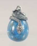 A SILVER MOUNTED LAPIS EGG SHAPED PENDANT. 3cm high
