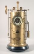 A BRONZE INDUSTRIAL STYLE CLOCK modelled as a steam boiler.
