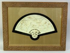A CHINESE CARVED HARDSTONE FAN SHAPE PLAQUE, carved with birds on a tree branch, framed and