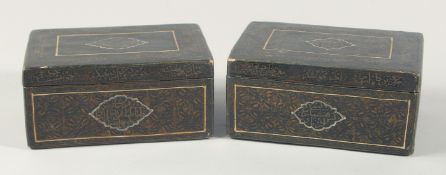 A PAIR OF EARLY 19TH CENTURY PERSIAN QAJAR SIGNED LACQUERED PAPIER-MACHE BOXES, with bands and