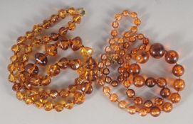 TWO AMBER BEAD NECKLACES