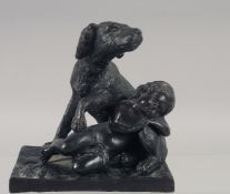 A BRONZE GROUP, A CHILD AND DOG. 5ins.
