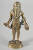 A 19TH CENTURY INDIAN BRASS FIGURE OF SADHU, 13cm high.