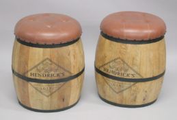 A PAIR OF NOVELTY HENDRICKS GIN BARREL SEATS. 1ft 9ins high.