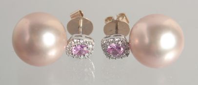 A PAIR OF PINK SAPPHIRE AND DIAMOND, PLUS 13.5mm PEARLS, EARRINGS.