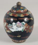 A JAPANESE CLOISONNE JAR AND COVER. 11cm high.