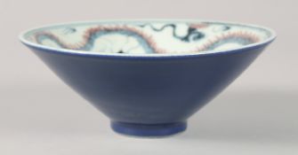 A CHINESE BLUE, RED AND WHITE PORCELAIN BOWL, painted with dragon to the interior, character mark to