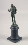 AFTER THE ANTIQUE, A BRONZE MALE NUDE. 5ins on a plinth.