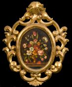 19th Century Continental School, a still life of flowers in an urn, oil on panel, 9.5
