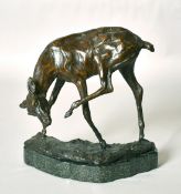 A 20th Century bronze sculpture of a deer scratching its head, signed CW and numbered 1/9 and