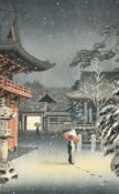 Tsuchiya Koitsu (1870-1949) Japanese, 'Snow at Nezu Shrine', woodcut, along with two further