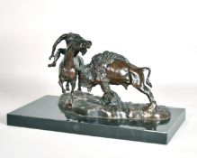 C M Russell, a buffalo attacking a horse ridden by a native American Indian, signed, on a marble