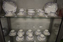 A good Royal Albert wisteria tea service comprising twelve cups, saucers and plates, pair of sugar