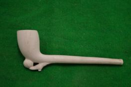 A decorative clay pipe.