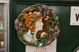 A pair of majolica plaques.