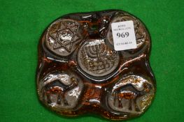 An unusual large moulded glass pendant.