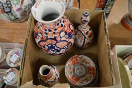 A Japanese imari vase and similar items.