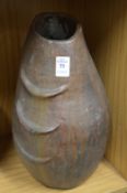 An unusual large pottery vase.