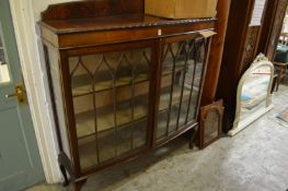 A mahogany display cabinet.