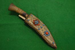 A miniature Gurkha Kukri.