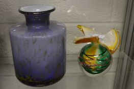 A decorative moulded glass paperweight, signed to the base together with a colourful glass vase.