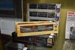 A collection of boxed military vehicles.