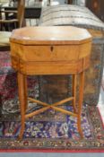 A good 19th century satinwood octagonal shaped work table.